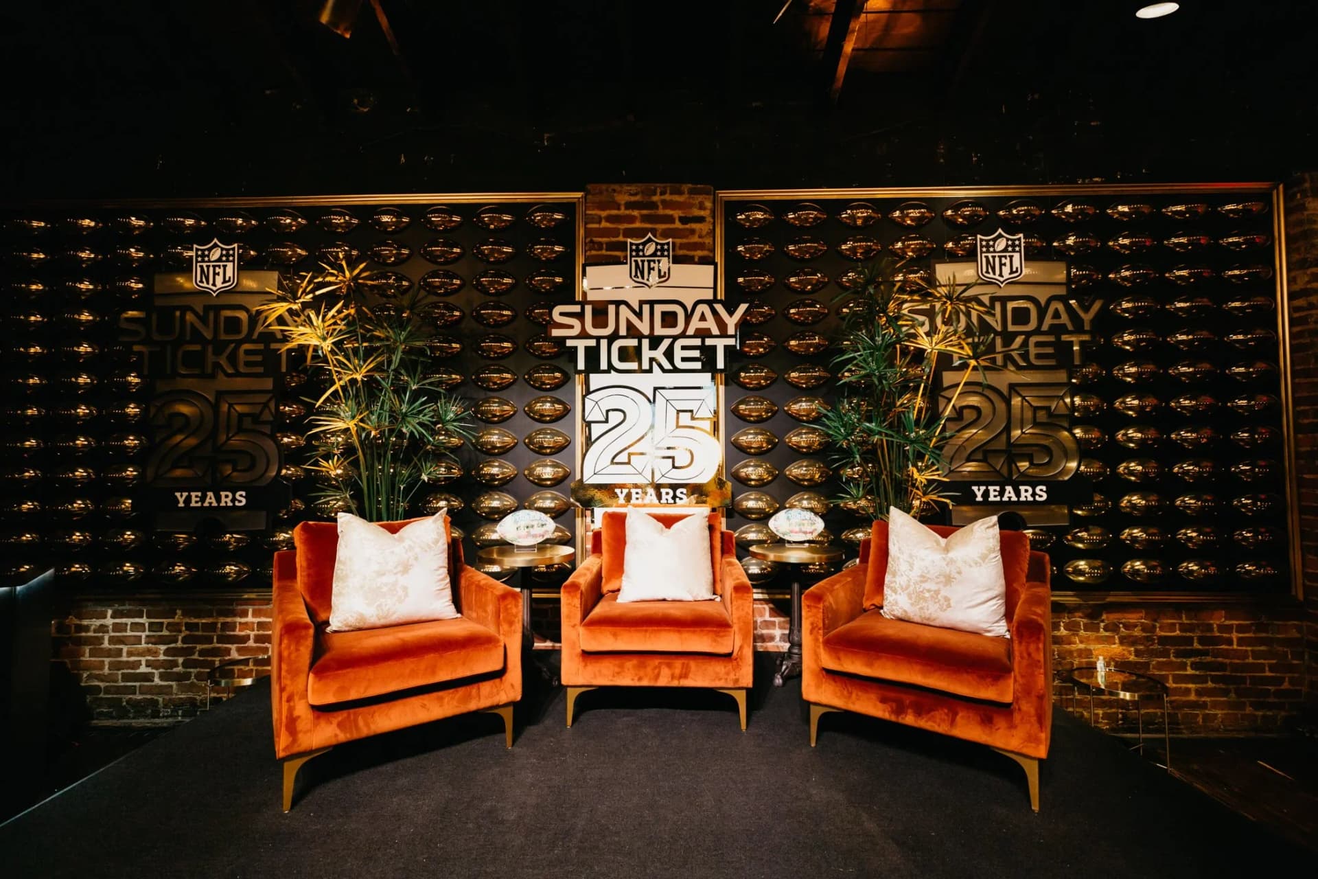 branded lounge photo moment with custom backdrop and event seating