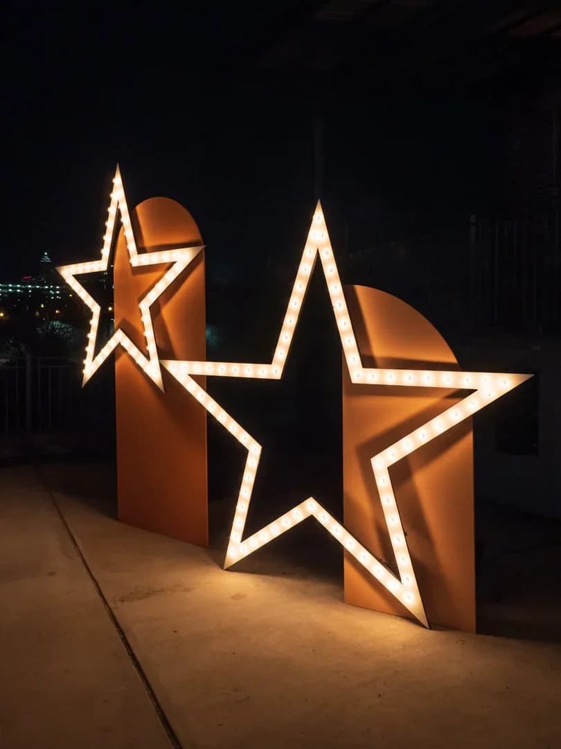 custom illuminated star props for branded event display