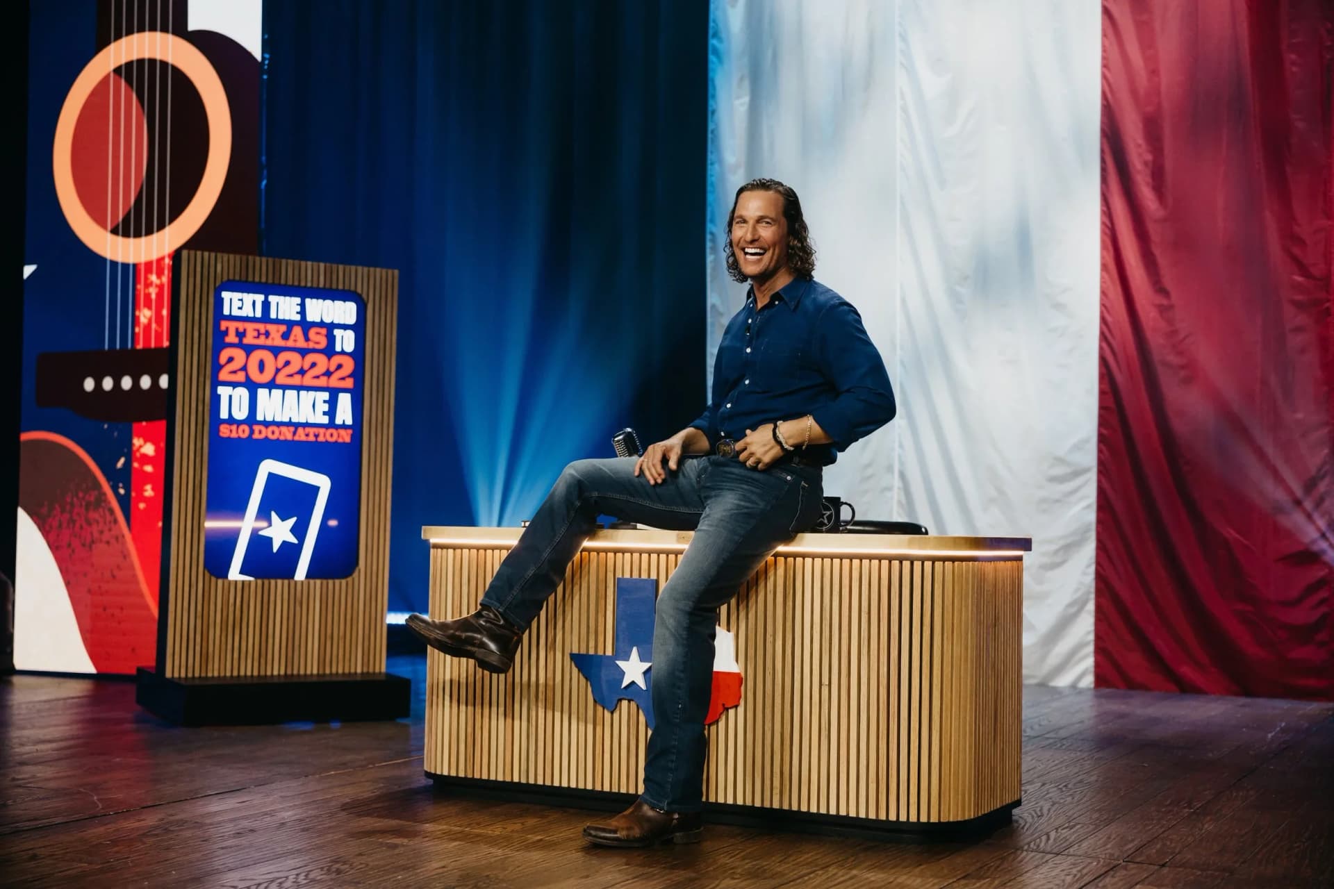 custom speaker podium with texas branded scenic backdrop