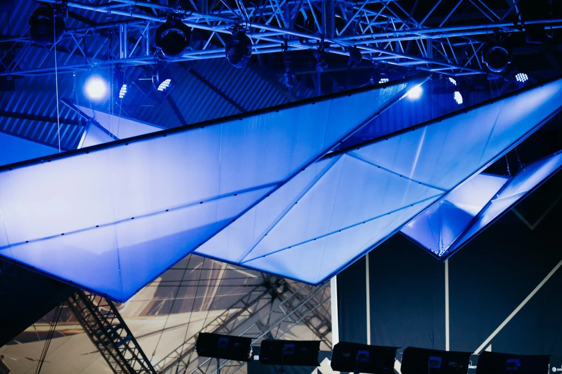 geometric scenic ceiling installation with illuminated panels