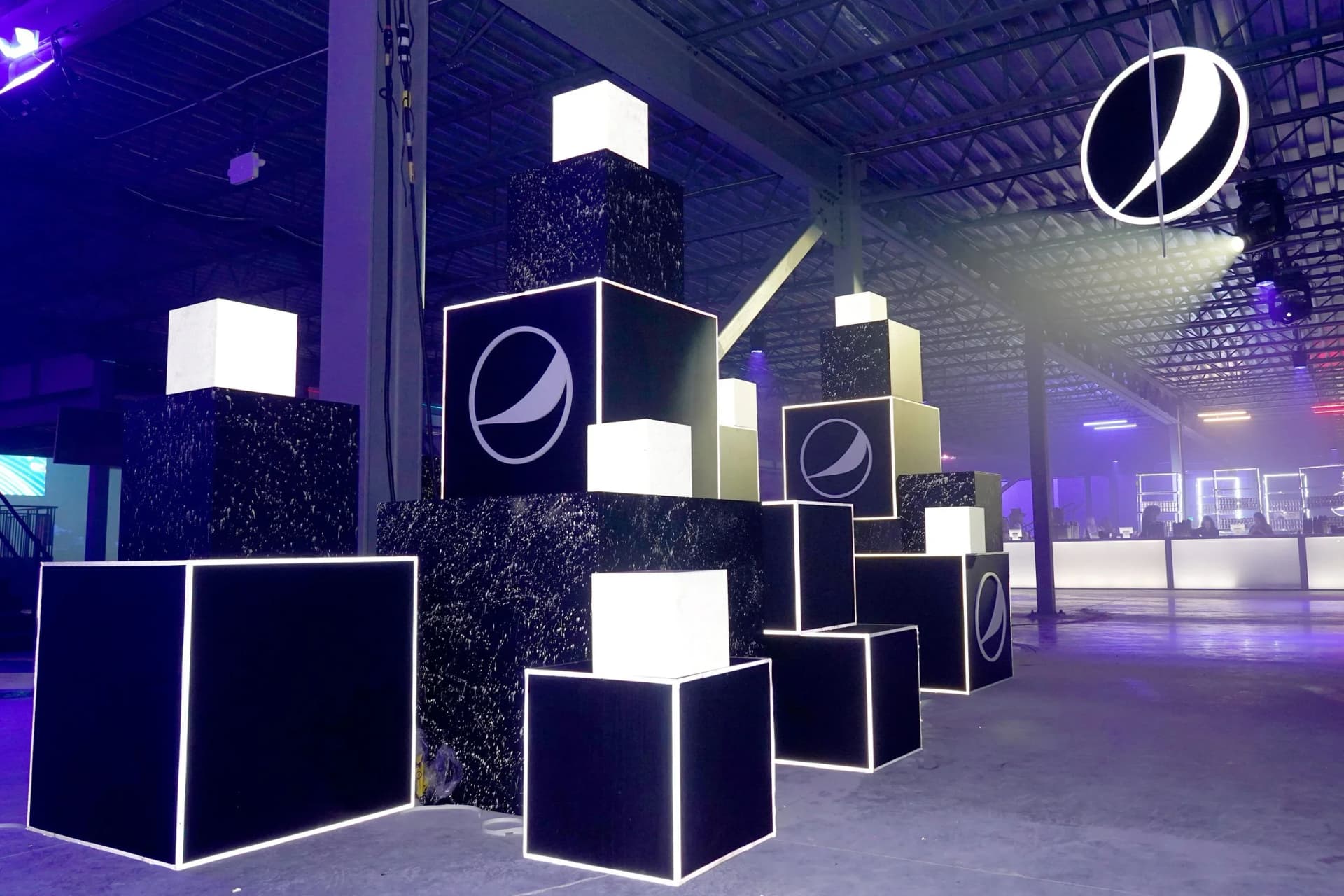 large scale branded event environment with illuminated cube displays