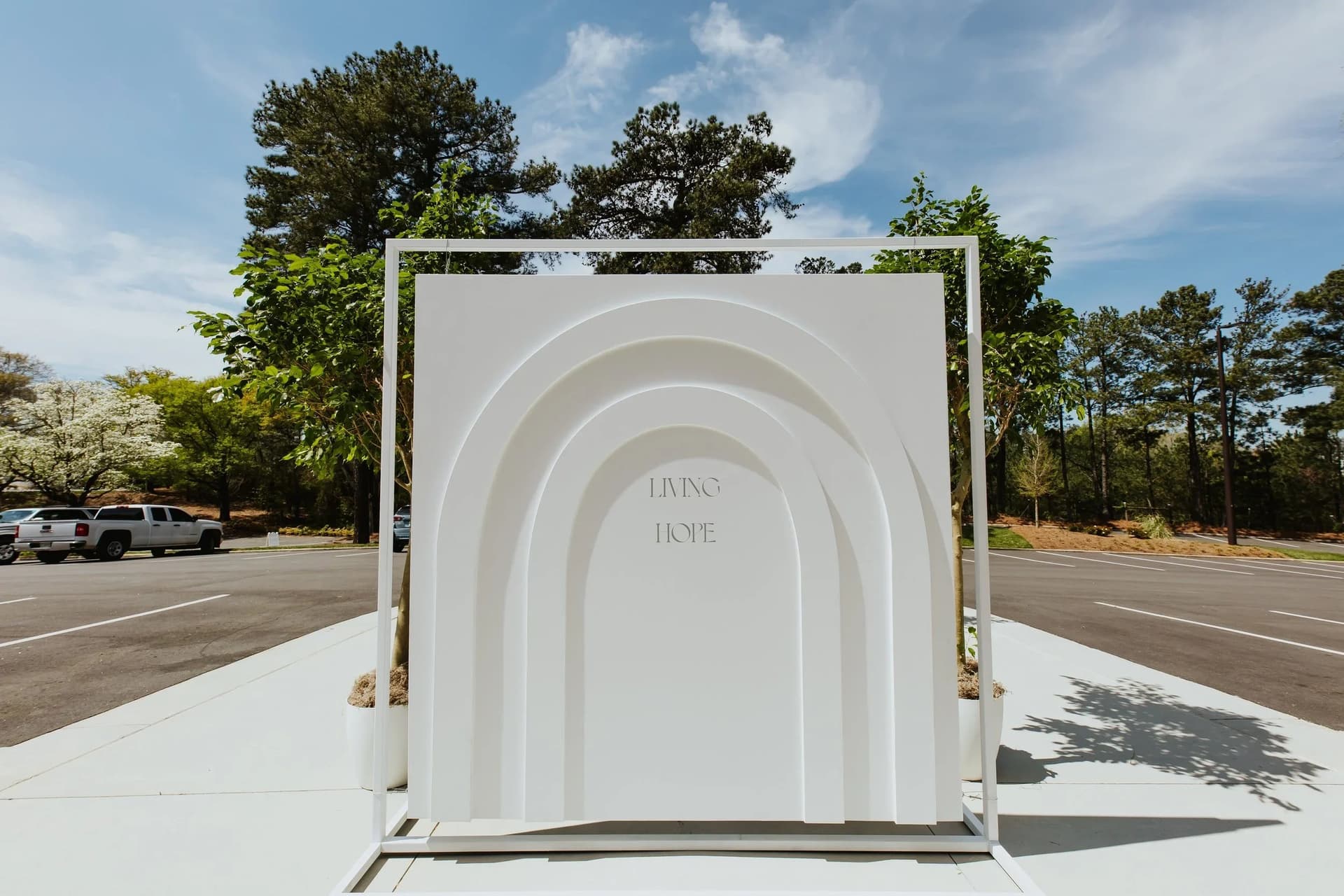 minimal outdoor photo opportunity with arched scenic backdrop